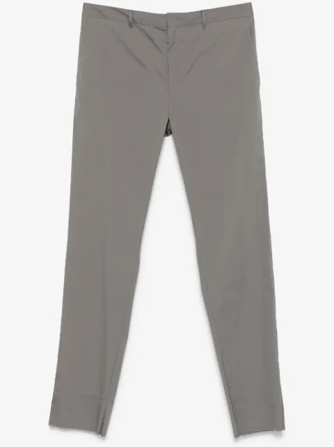 Prada triangle-logo trousers 