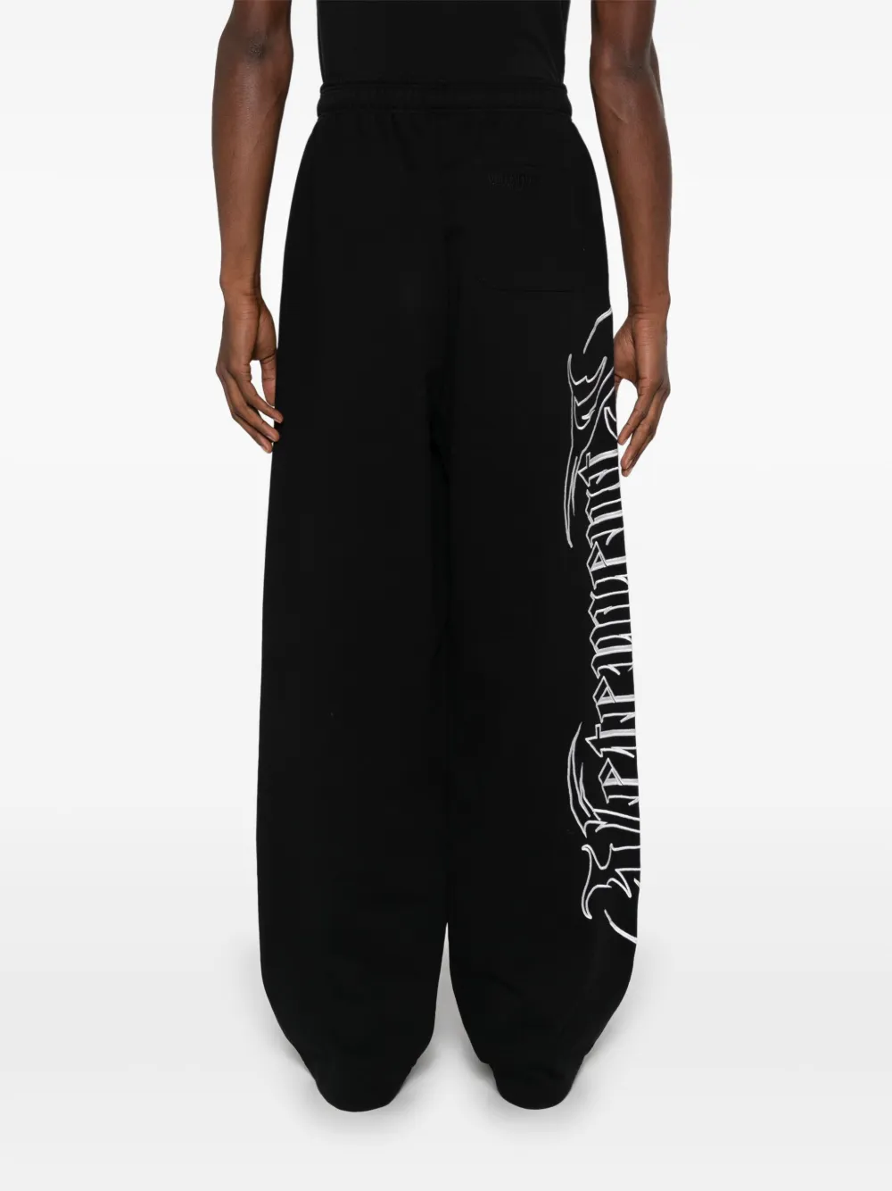 VETEMENTS LOGO-EMBROIDERED TROUSERS