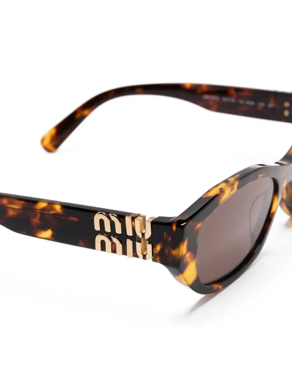 Miu Miu Eyewear tortoiseshell-effect Sunglasses | Brown | FARFETCH