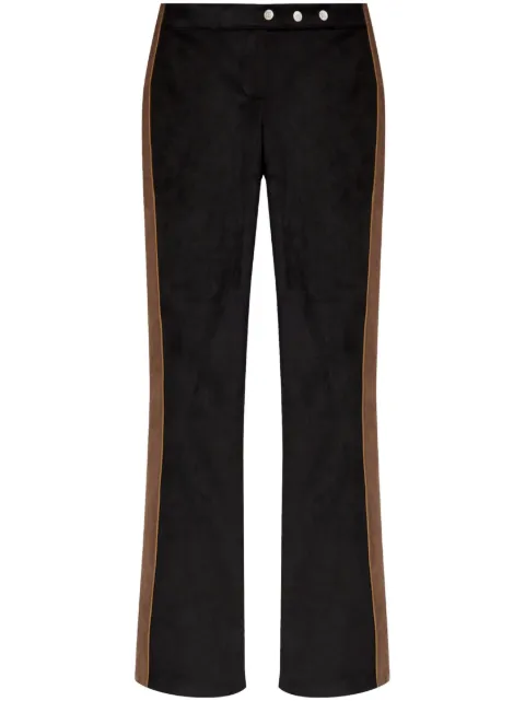 MISBHV pantalones acampanados con rayas laterales