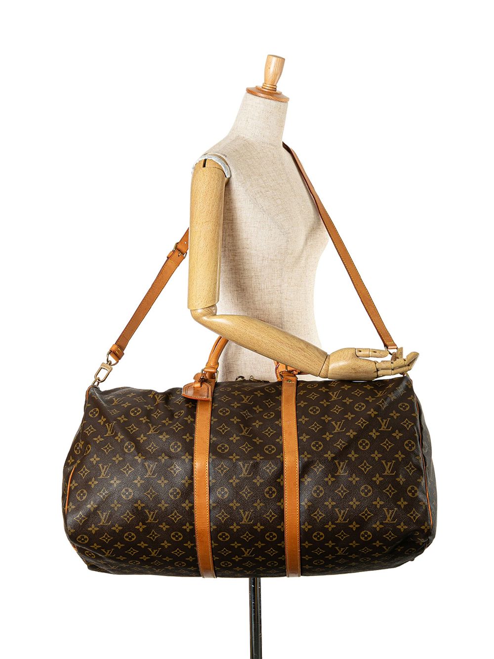 Louis Vuitton Pre-Owned 1994 Monogram Keepall Bandouliere 60 travel bag - Bruin