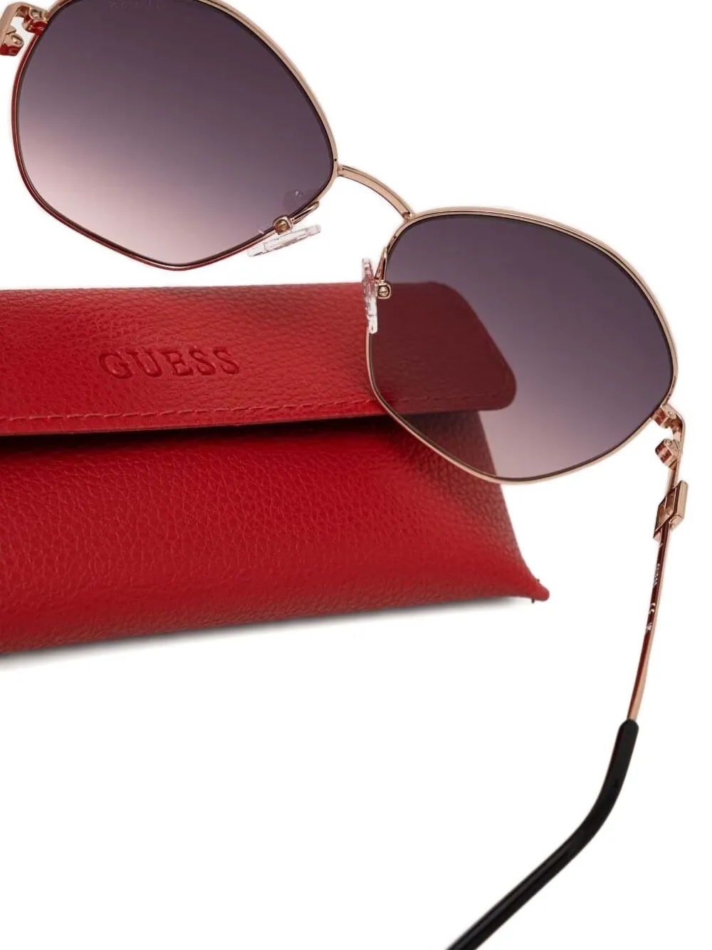 GUESS EYEWEAR Zonnebril met geometrisch montuur Goud