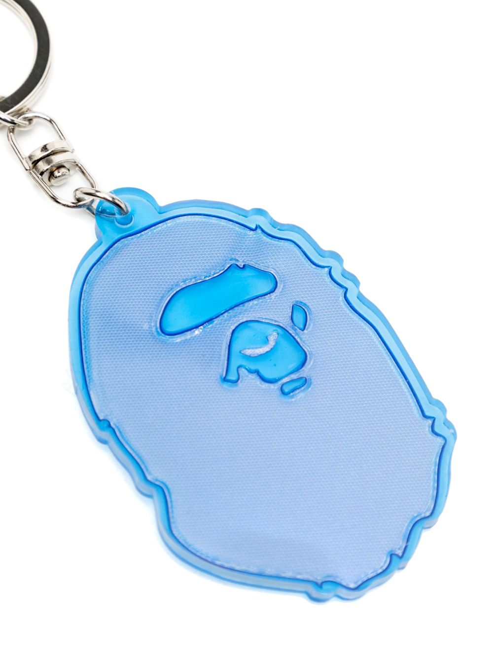 A BATHING APE® Reflecterende sleutelhanger met apenhoofd - Blauw