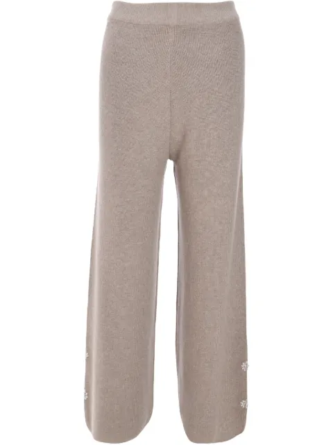 Izaak Azanei pantalones con placa del logo