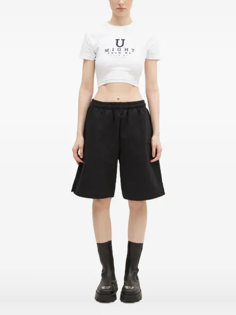 VETEMENTS توب قصير بزينة عين