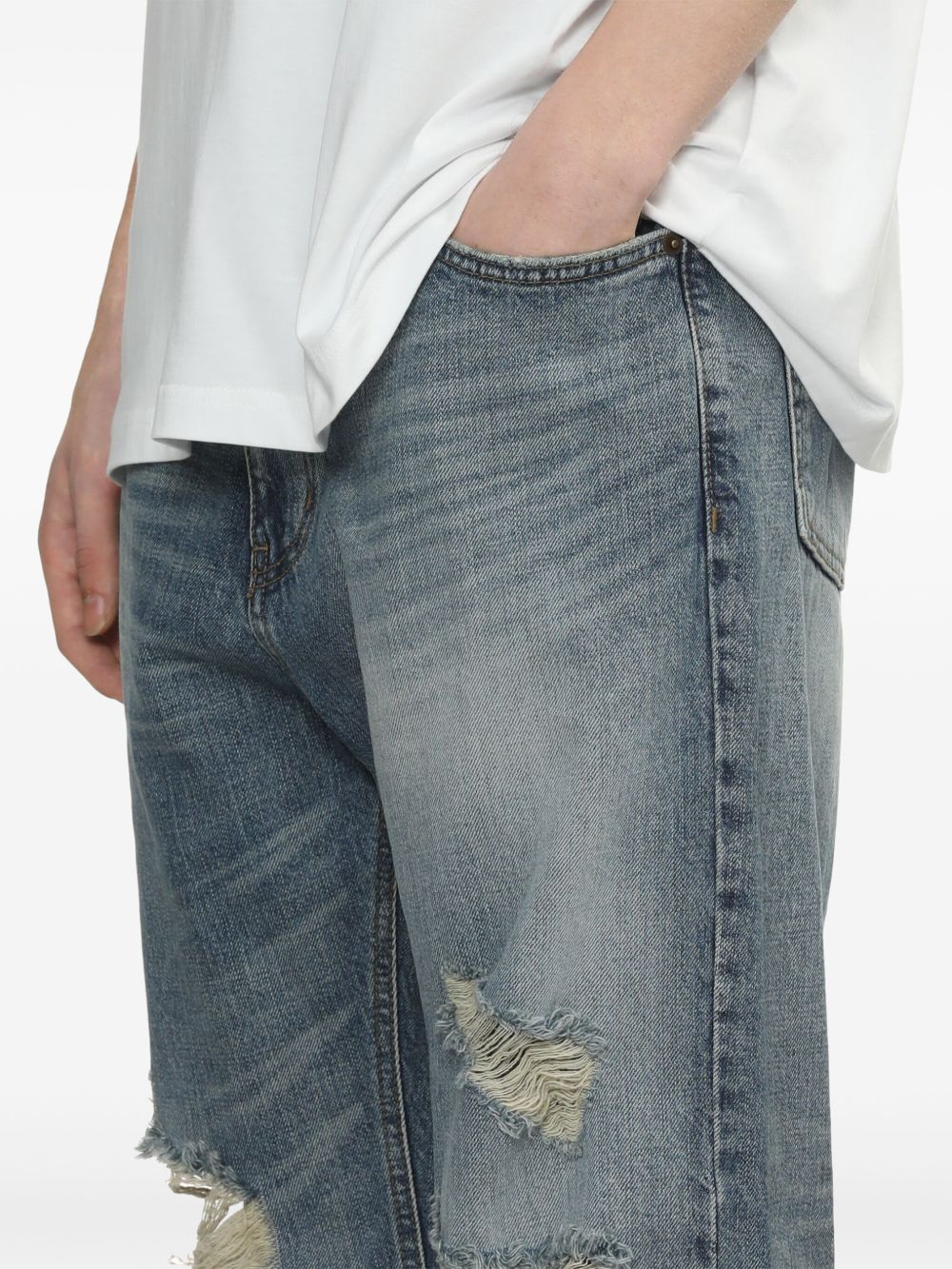 WE11 DONE DISTRESSED LOOSE-FIT JEANS