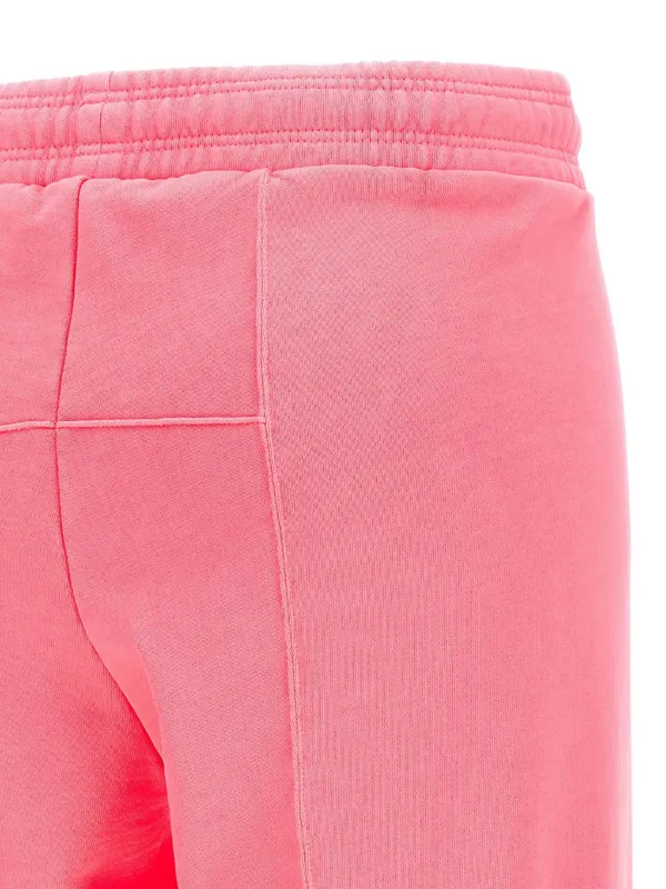 VETEMENTS Oval Logo Track Pants | Pink | FARFETCH ID