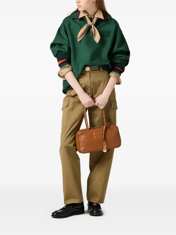 新品 miu miu 裾ボタン クロップドパンツ ダークグリーン サイズ38 Miu Miu ガーメントダイ パンツ | グリーン | FARFETCH JP