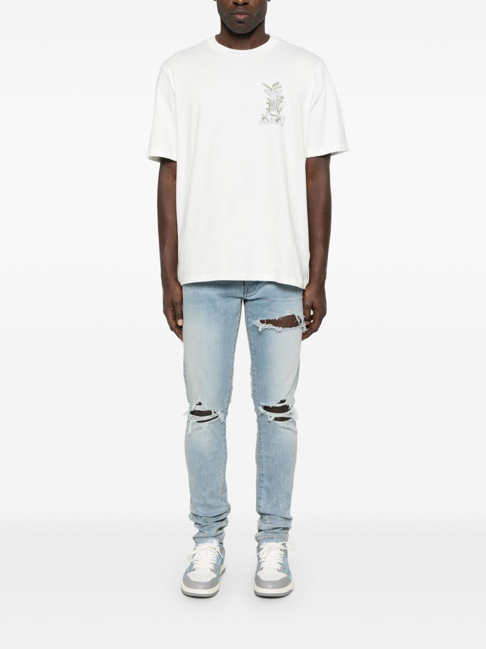 AMIRI Gerafelde jeans - Blauw