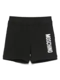 Moschino Kids logo-lettering shorts - Black