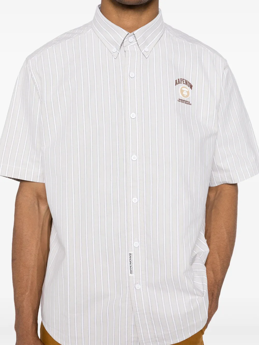 AAPE BY *A BATHING APE AAPENOW gestreept overhemd met moonface-logo Beige