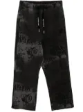 AAPE BY *A BATHING APE® graffiti-print track pants - Black