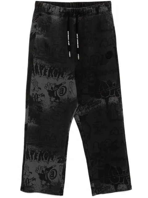 AAPE BY *A BATHING APE® graffiti-print track pants