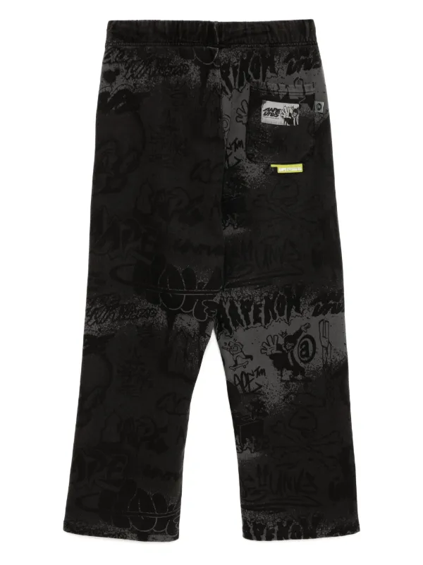 AAPE BY *A BATHING APE® グラフィティ トラックパンツ | ブラック