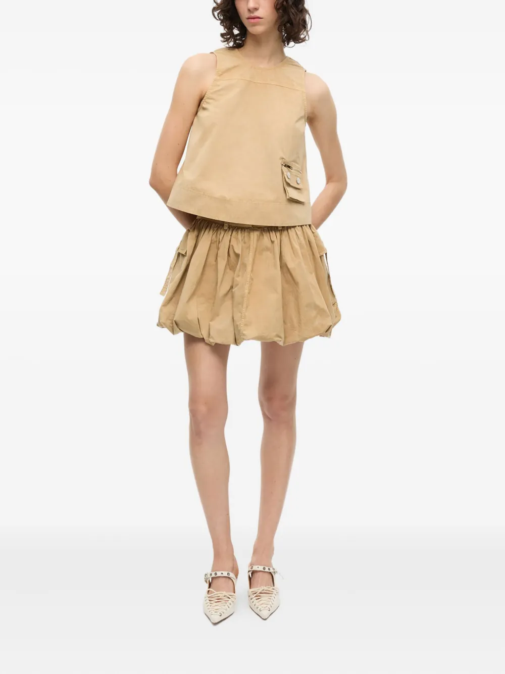 GANNI Mouwloze top Beige