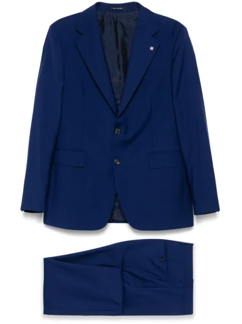 Tagliatore traje con botones