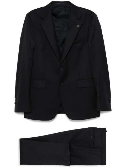Tagliatore traje con botones