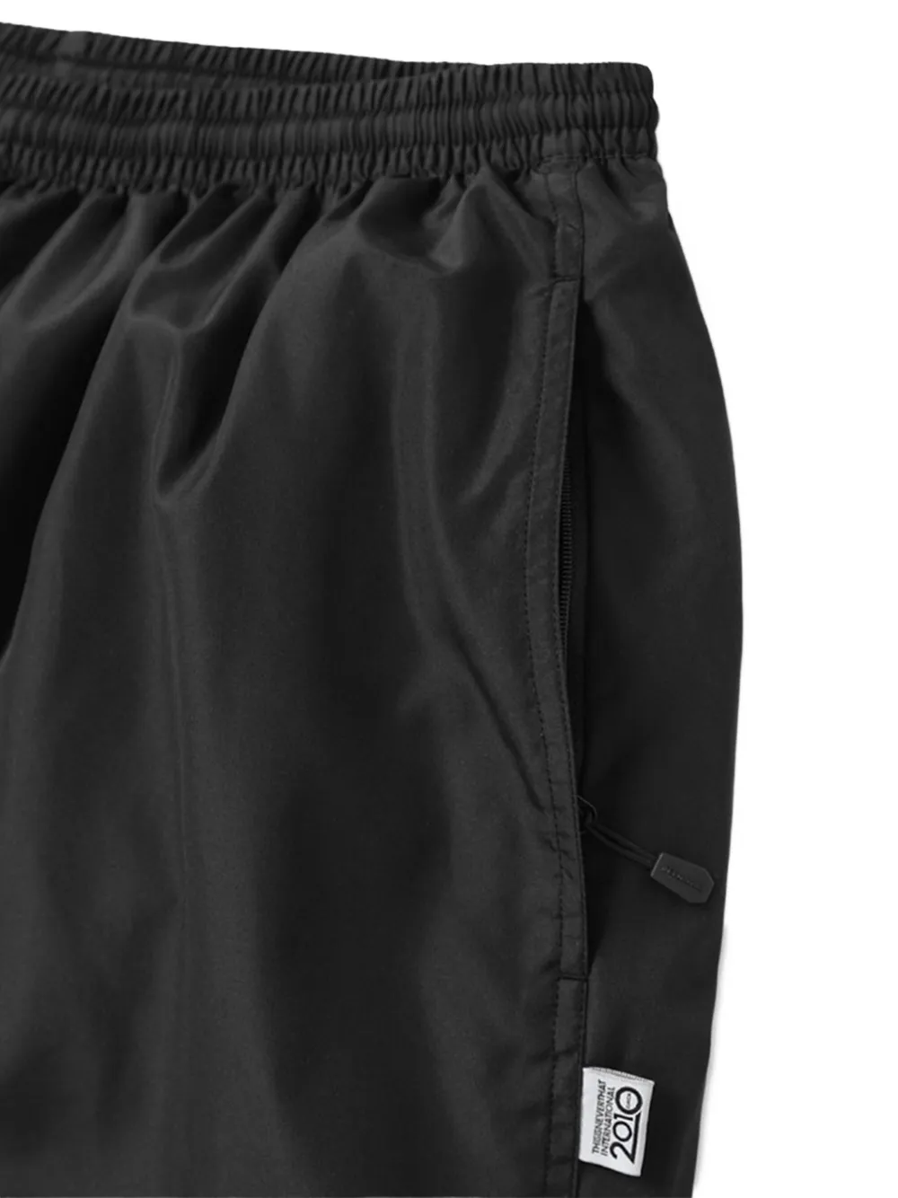 This Is Never That Warm Up broek met ritszak en trekkoord Zwart