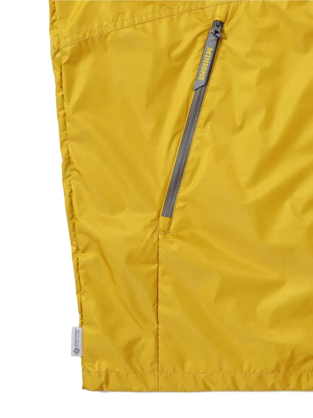 This Is Never That x Minions Windstopper jacket Geel