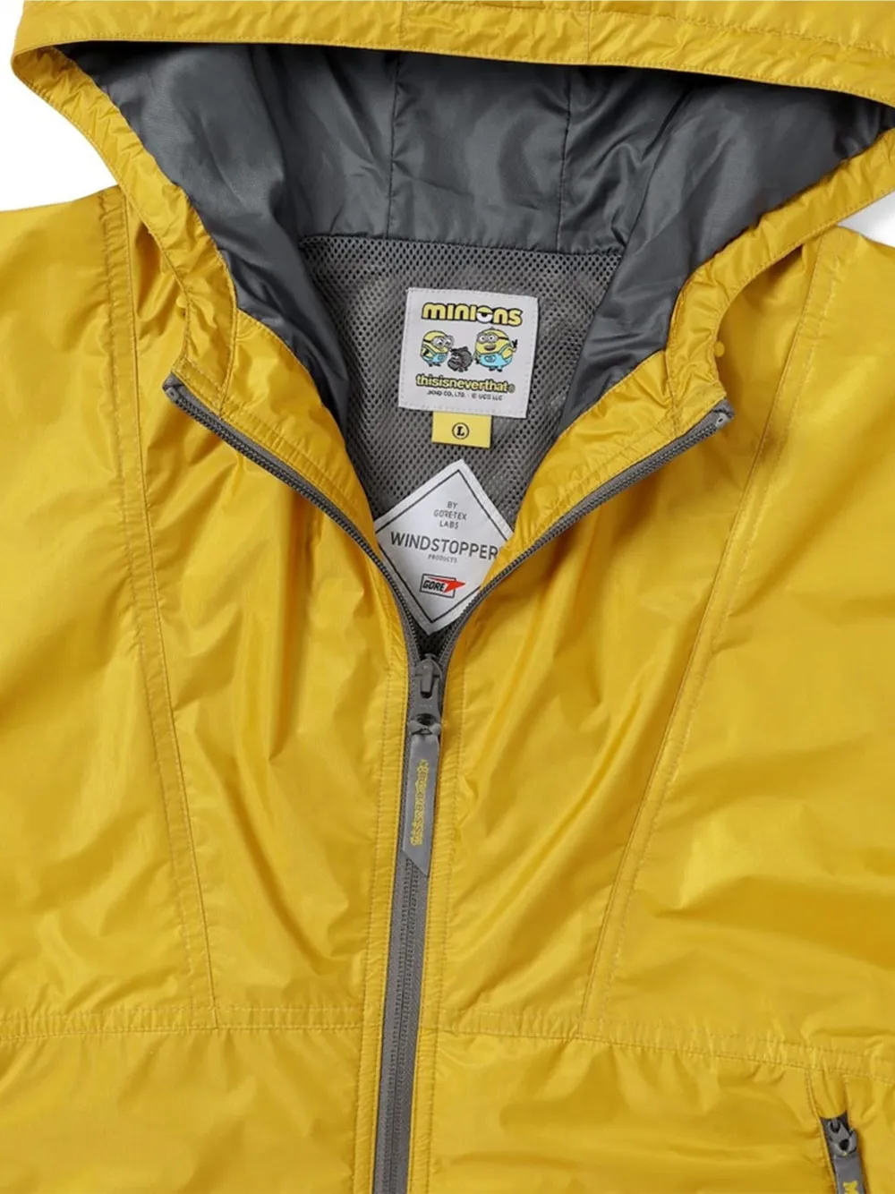 This Is Never That x Minions Windstopper jacket Geel