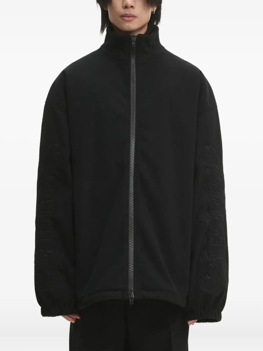 VETEMENTS logo-embossed zip-up jacket Zwart