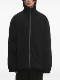 VETEMENTS logo-embossed zip-up jacket - Black