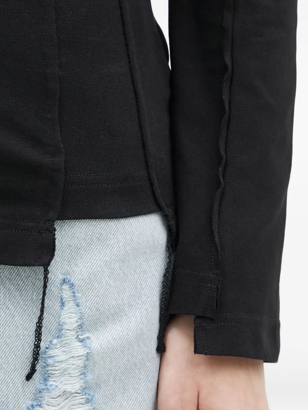 VETEMENTS exposed-seam T-shirt Zwart