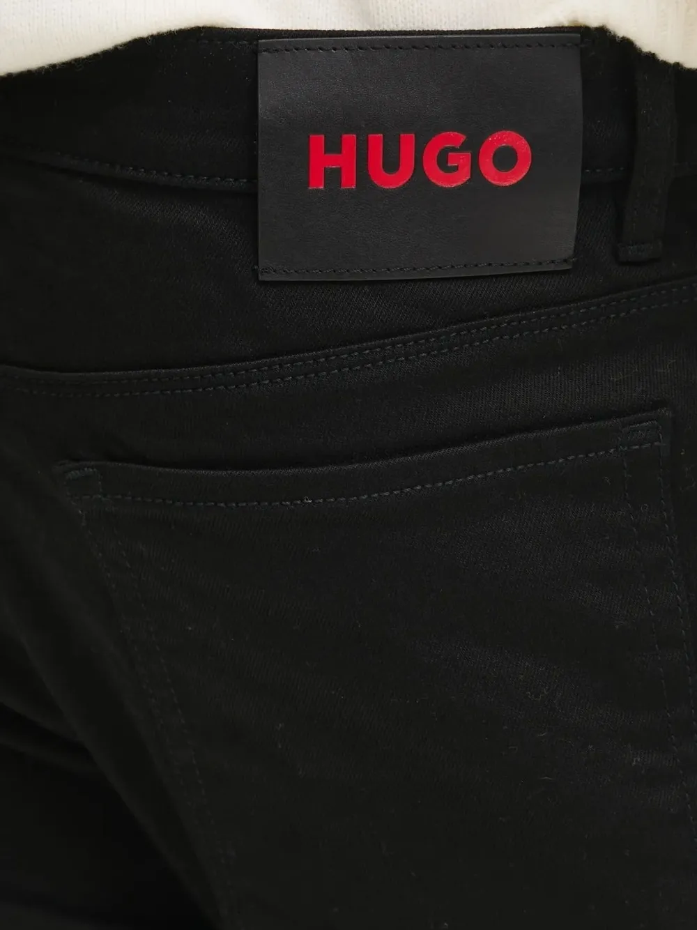 HUGO logo-patch slim-fit jeans Zwart