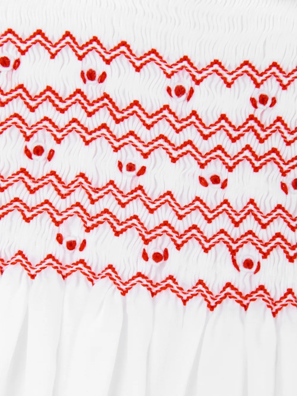 Sarah Louise Jurk met gesmockt vlak Wit