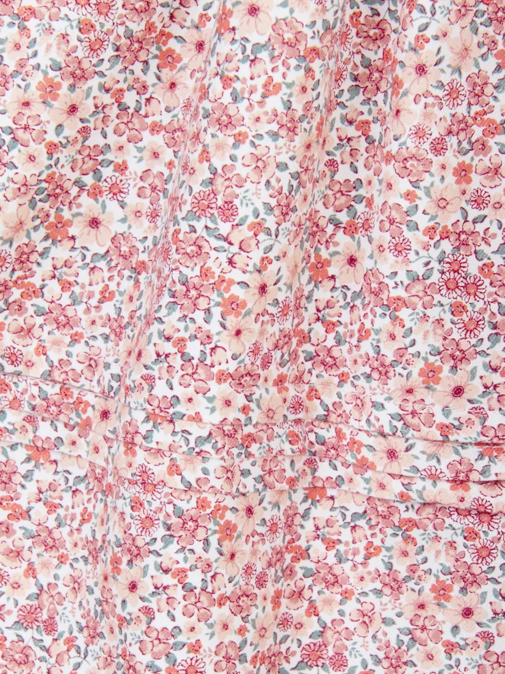 Sarah Louise Jurk met bloemenprint en gesmockt vlak Roze