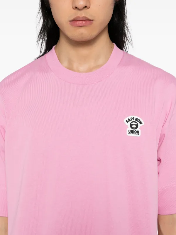 AAPE BY *A BATHING APE® ムーンフェイスロゴ Tシャツ | ピンク