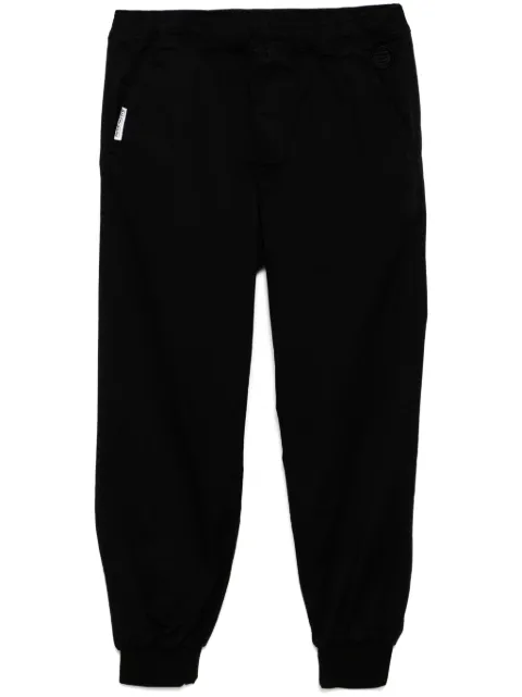 AAPE BY *A BATHING APE® pantalones tapered con parche del logo