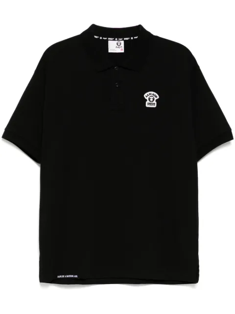 AAPE BY *A BATHING APE® playera tipo polo con logo Moonface