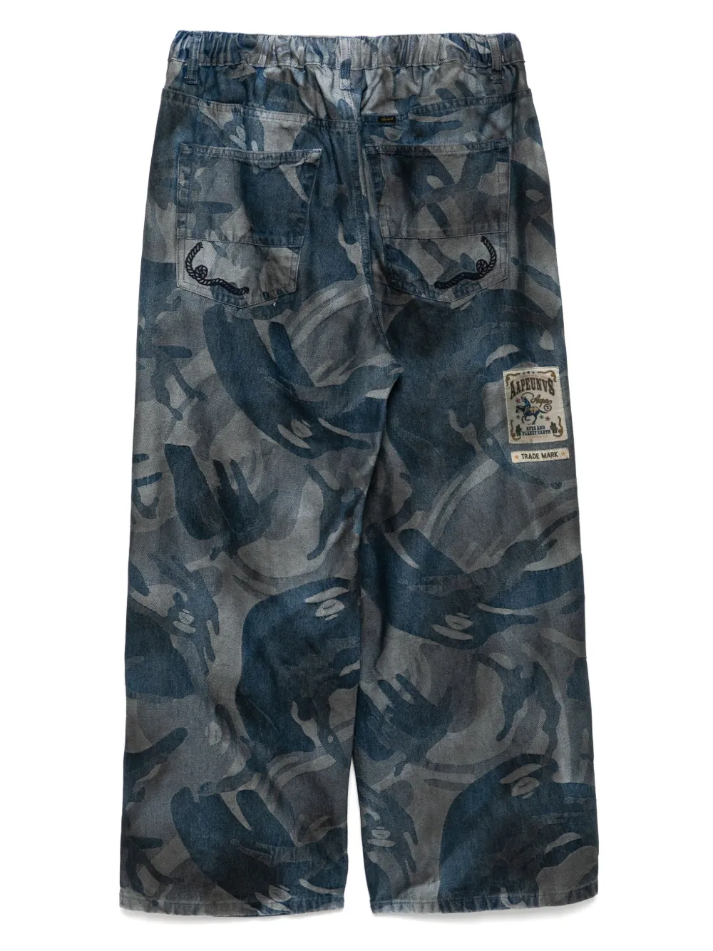 AAPE BY *A BATHING APE Verwassen jeans met maangezicht-logo - Blauw