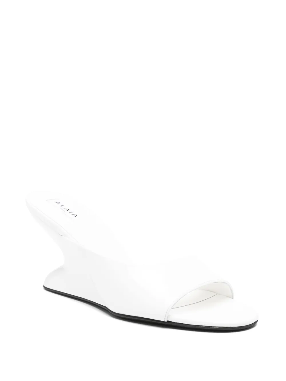 Alaïa 75mm wedged mules | Heeled Mules | Image 2