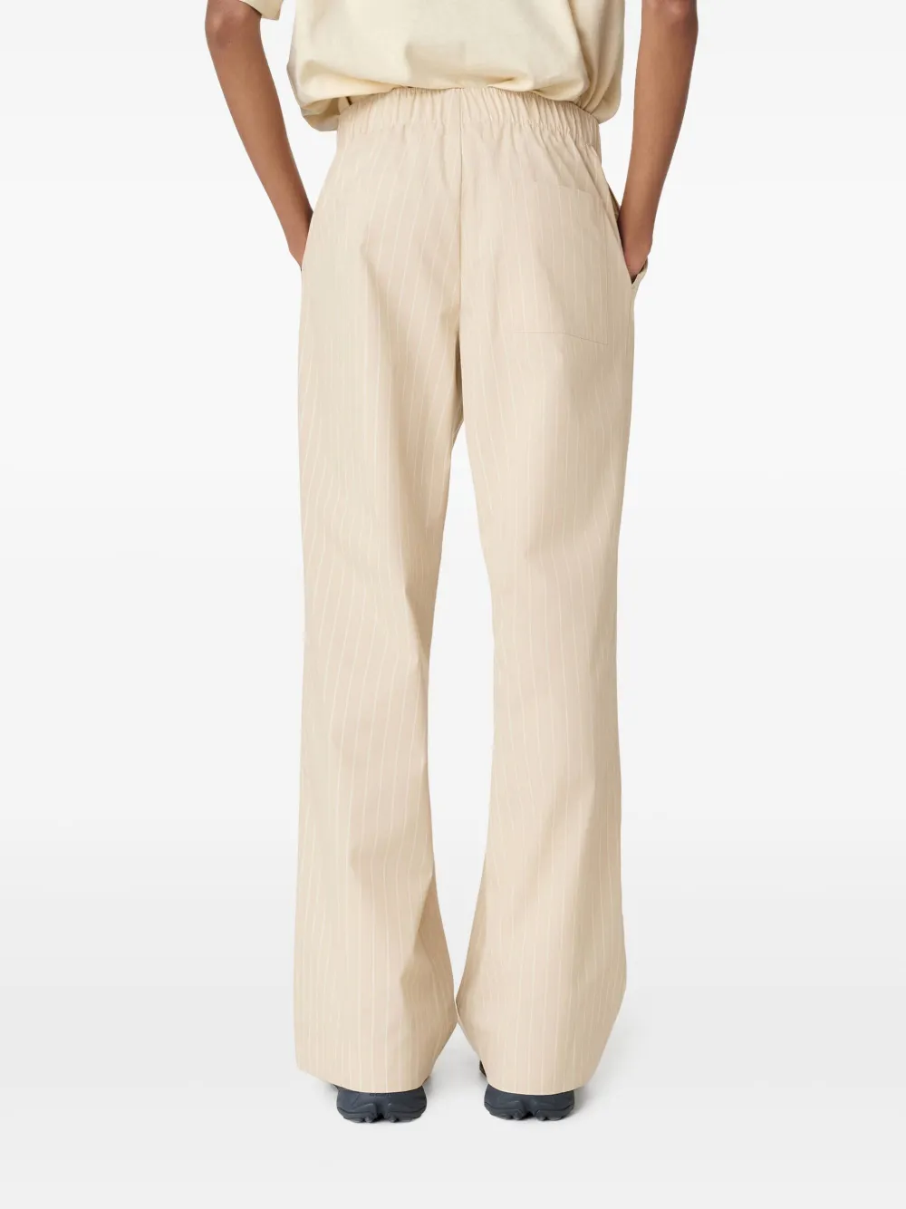 Axel Arigato Gestreepte katoenen broek Beige