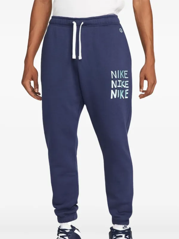 blue track pants nike