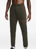 Nike Dri-FIT ""Sequoia/Picante Red"" track trousers - Green