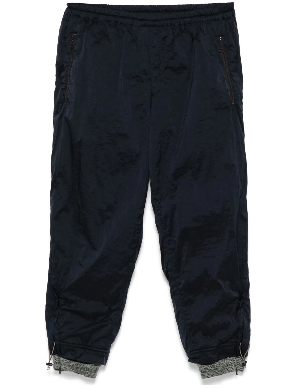 layered track pants