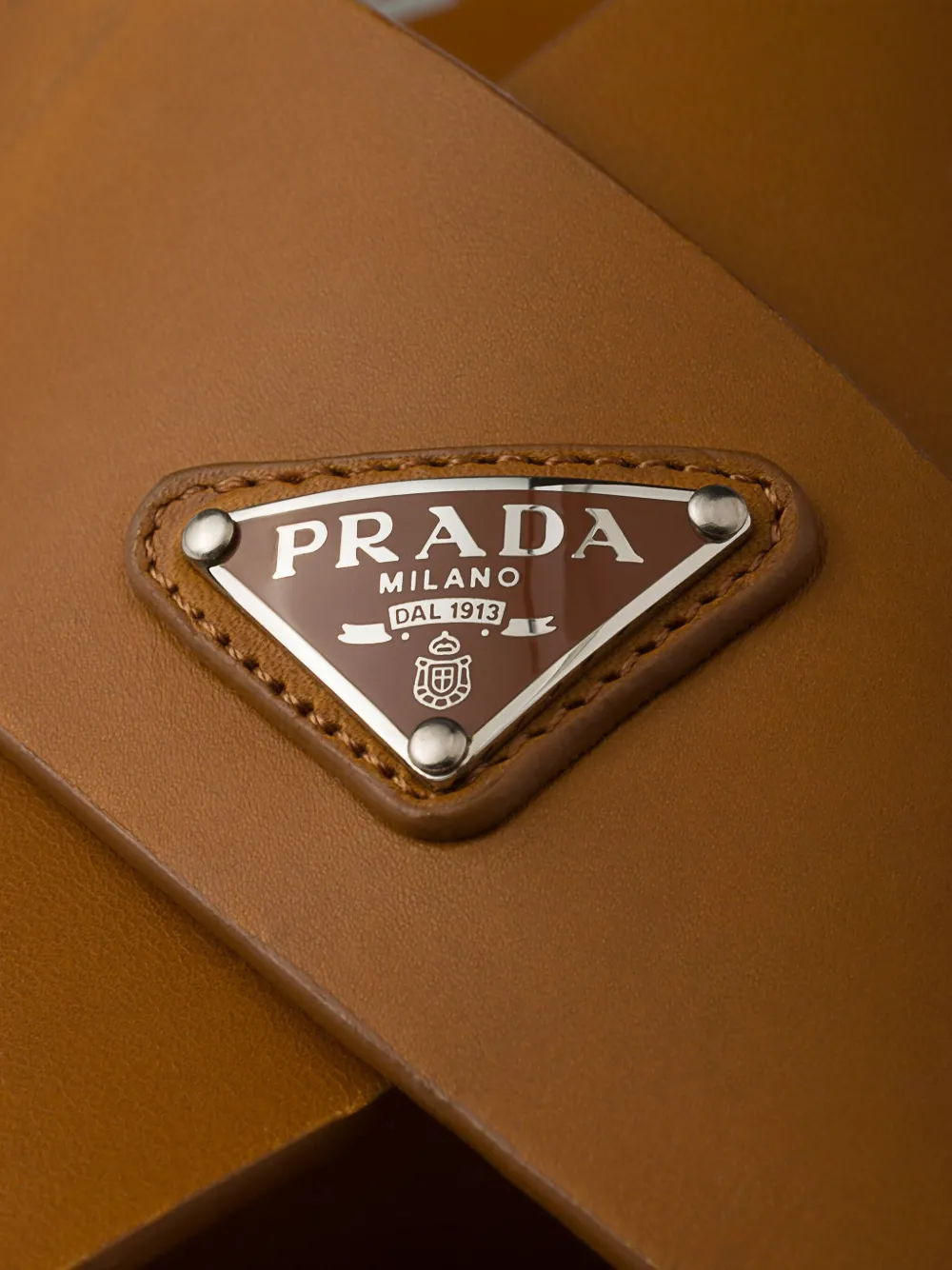 Prada crisscross leather slides Brown