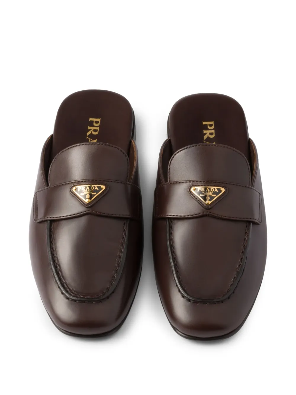 Prada Leren slippers Bruin