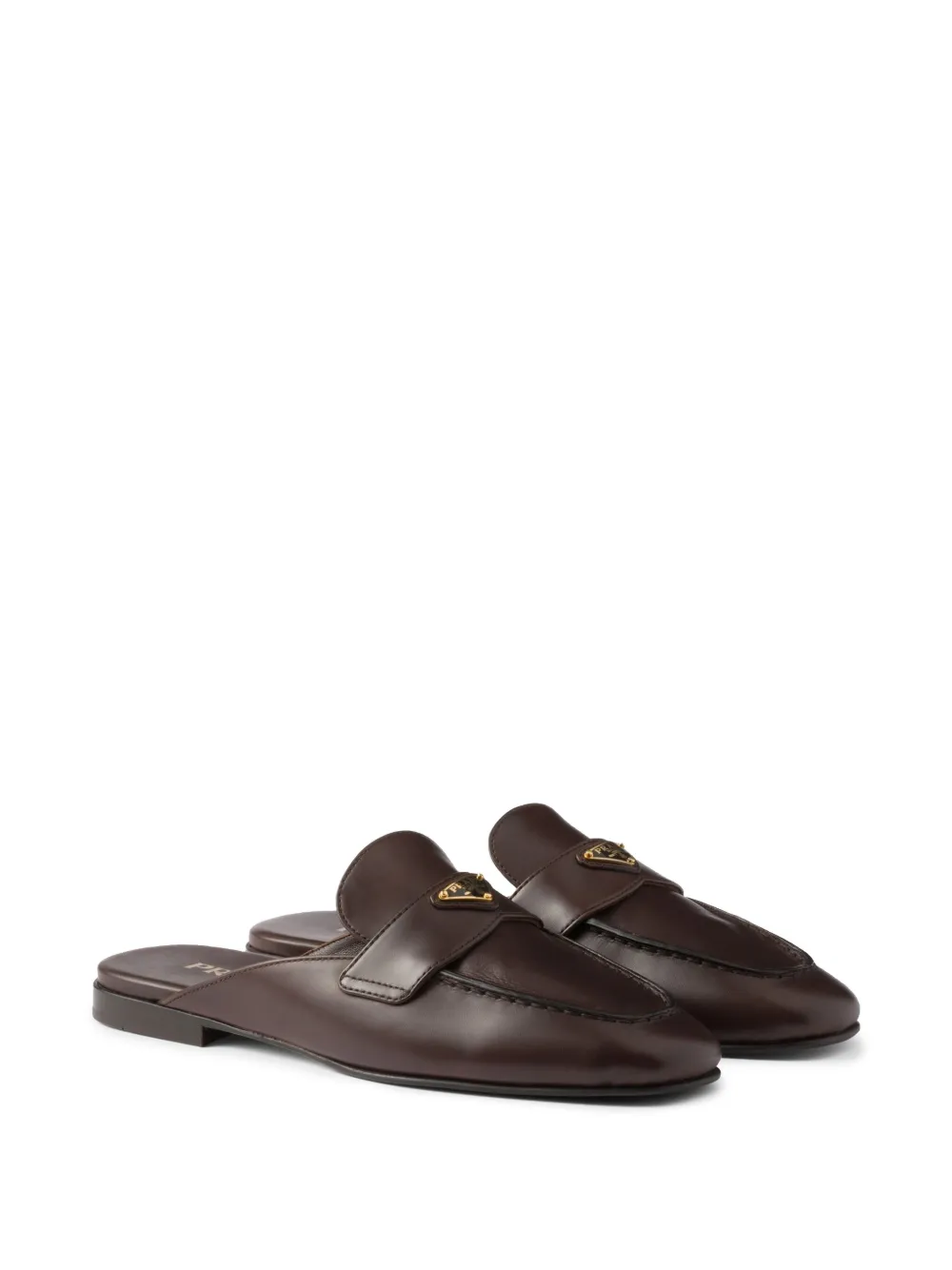 Prada Leren slippers Bruin