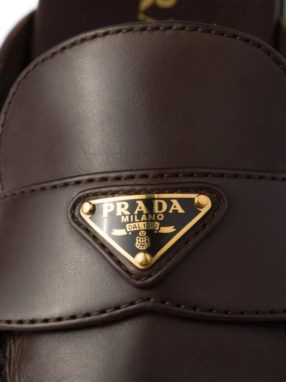 Prada Leren slippers Bruin