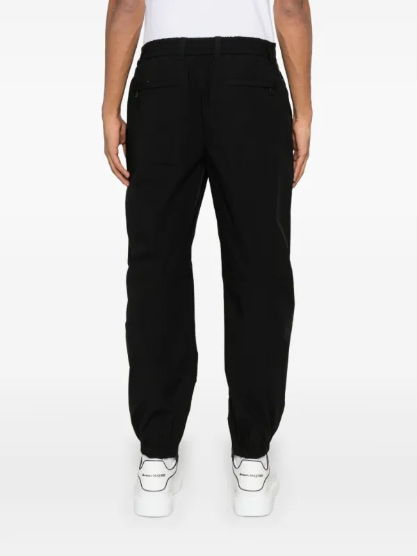 Dolce & Gabbana logo-plaque Tapered Trousers | Black