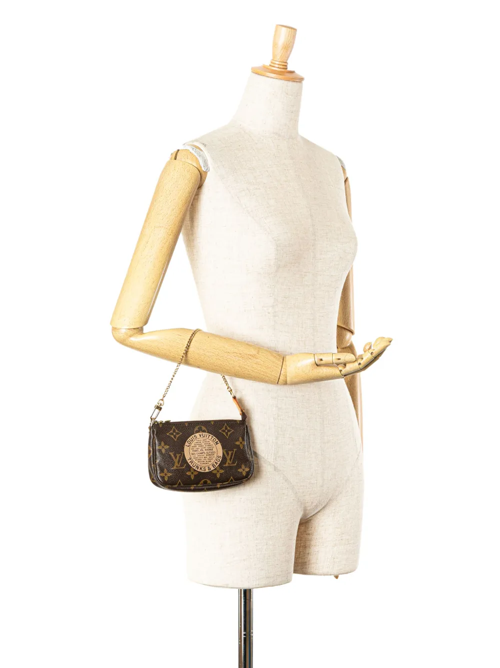 Louis Vuitton Pre-Owned 2007 Monogram Trunks and Bags Mini Pochette Accessoires handbag - Bruin