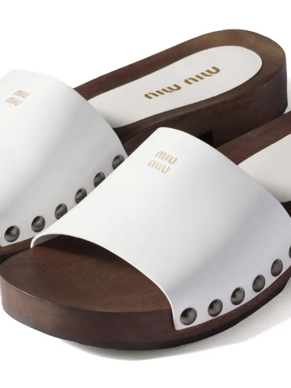 Miu Miu patent-leather Clogs | White | FARFETCH UZ