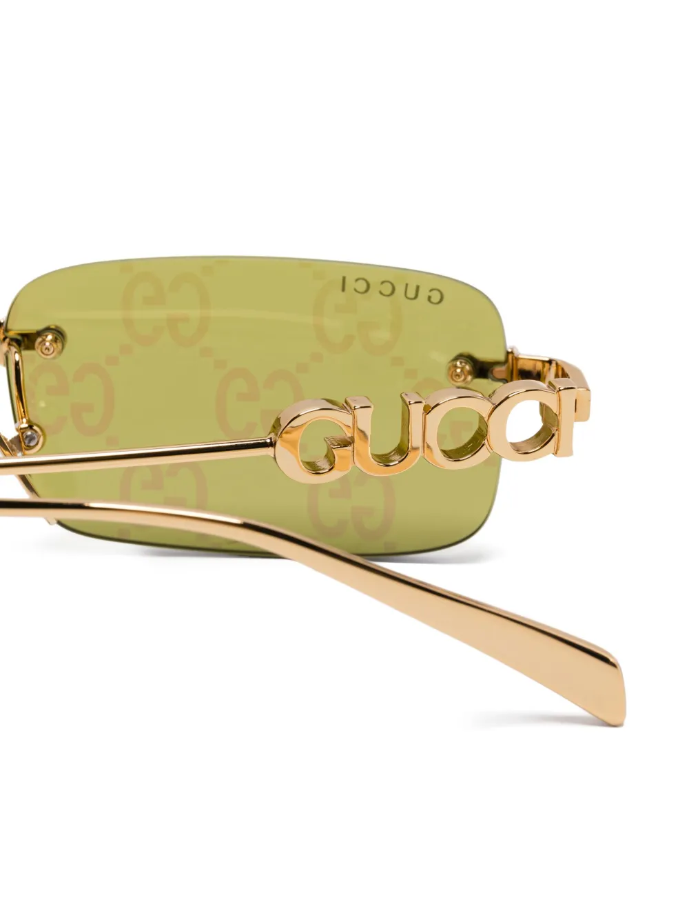 Gucci Eyewear Zonnebril met randloze montuur Goud
