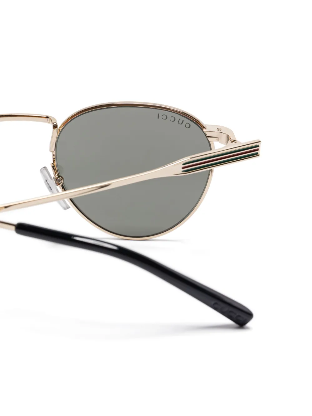 Gucci Eyewear Zonnebril met ovalen montuur Goud