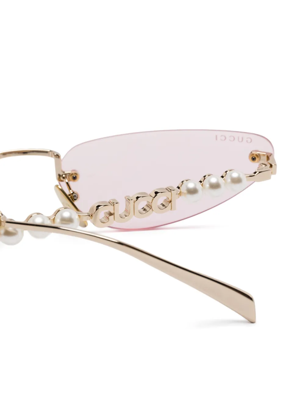 Gucci Eyewear Zonnebril met randloze montuur Goud