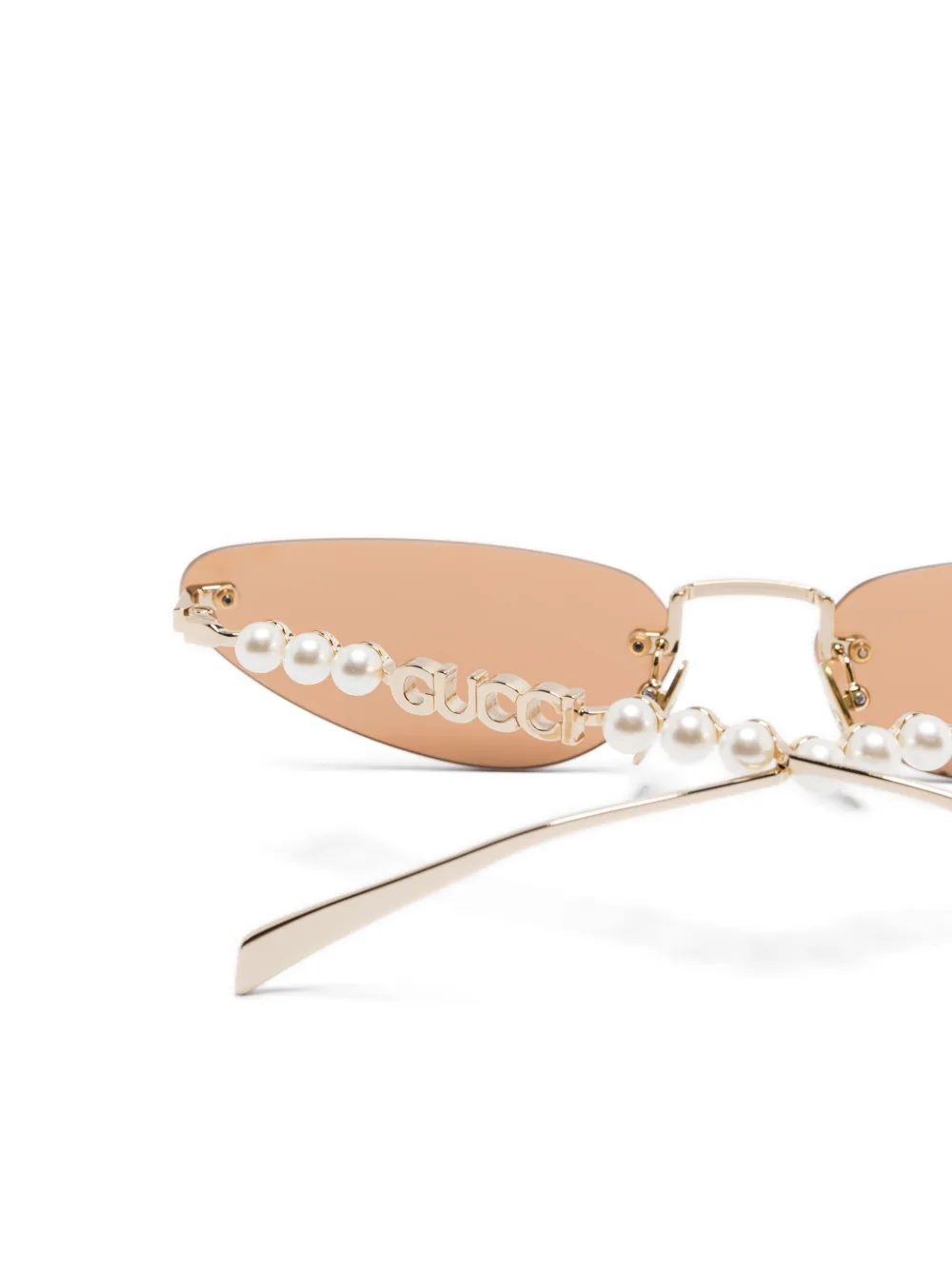 Gucci Eyewear Zonnebril met randloze montuur Goud